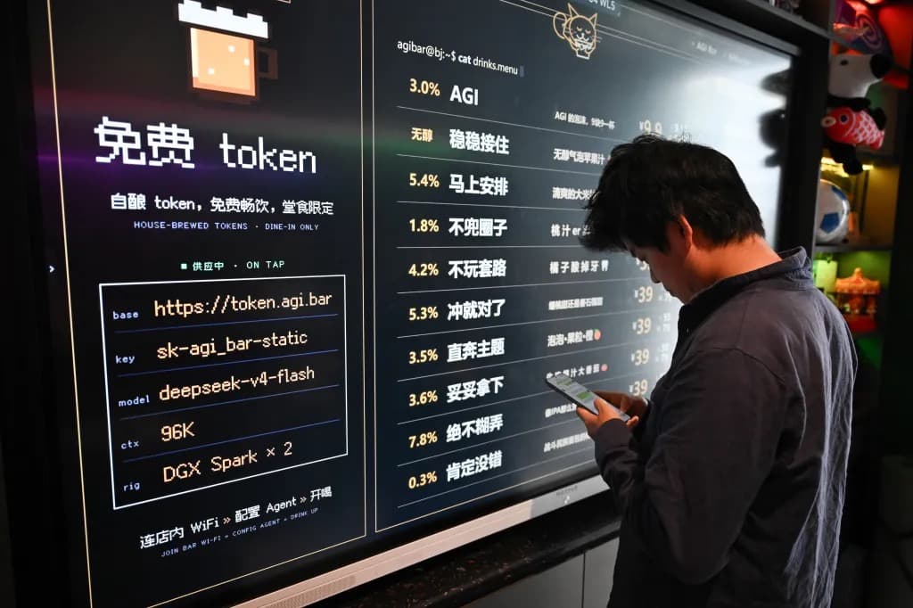 A man checking his phone in front of a digital menu board advertising AI tokens
