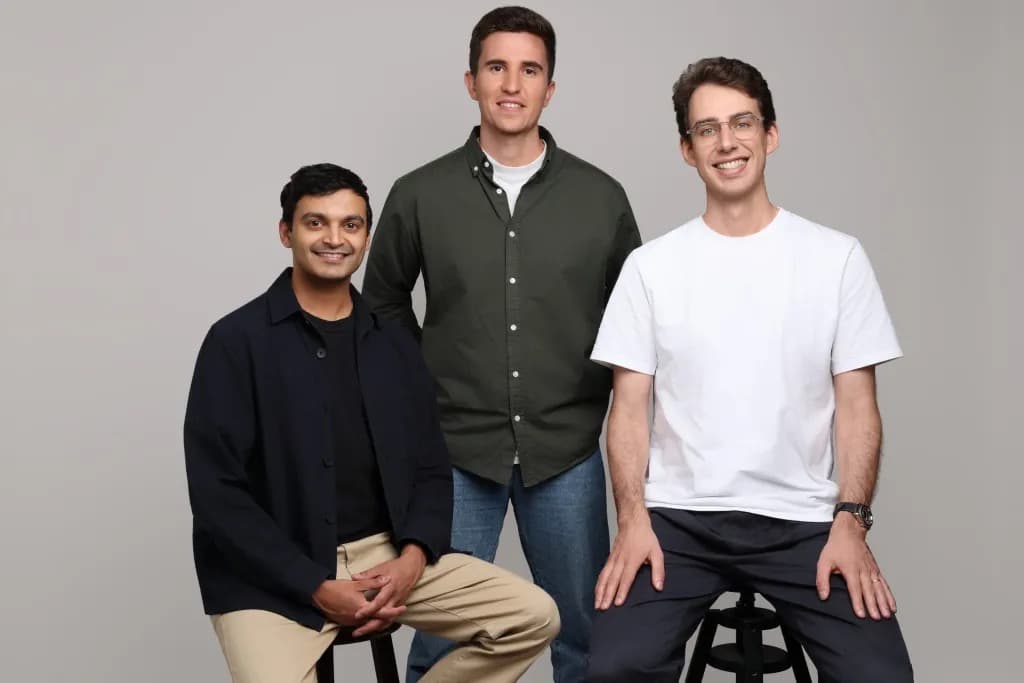 The three cofounders of Marloo posing together for a studio portrait