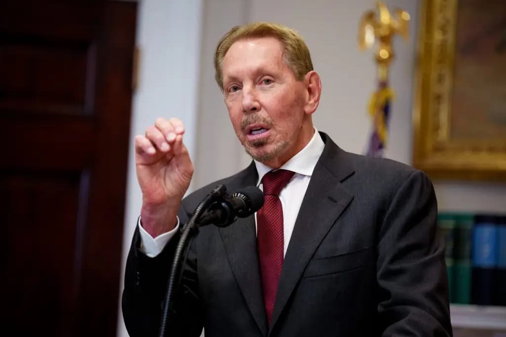 Larry Ellison speaking at a podium
